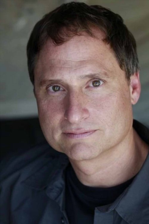 Paul Mercier as Leon S. Kennedy / Merchant (voice)