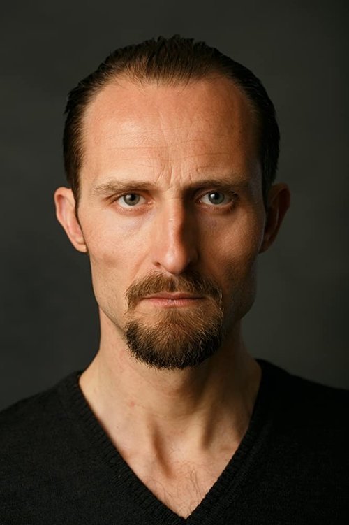 Alan O'Silva as Father Alexei (as Alin Olteanu)