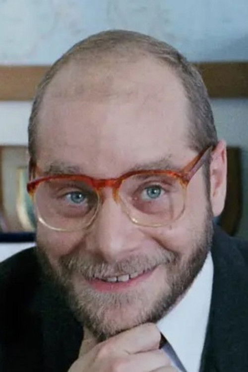 Paul Fonoroff as Secretary of Security