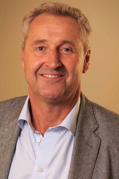 Mark Austin as Newsreader