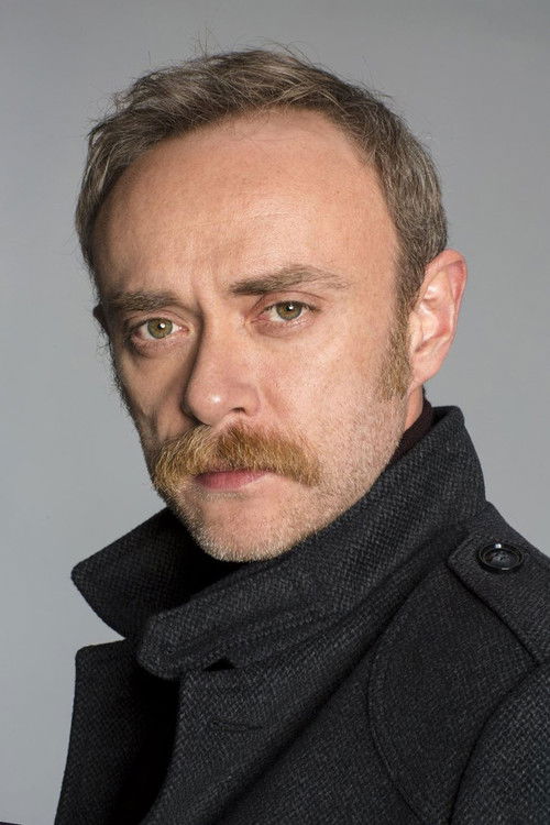 Tansu Biçer as Father