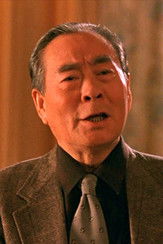 Jin Wang as Pin Tan Player