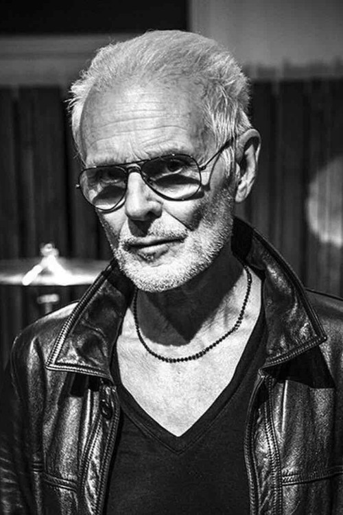 Michael Des Barres as Malcolm Graves