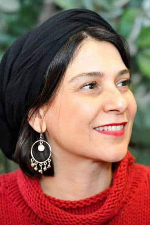 Mona Zandi Haghighi as 