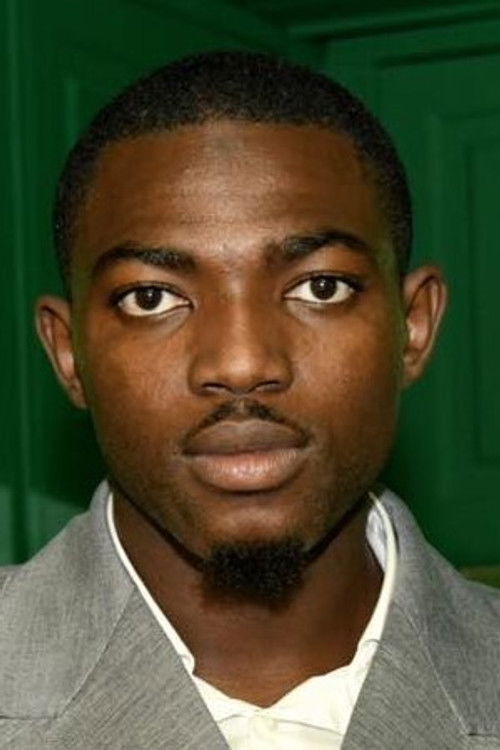 Sacko Camara as Refugee on the phone