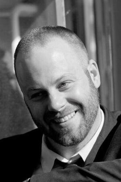 Patrick J. MacEachern as John Carbon