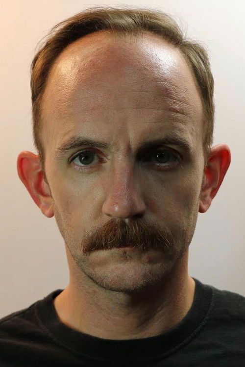 Benjamin D. Ploughman as Store Manager