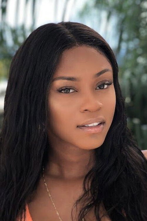 Latoya Webb as Woman at Desk