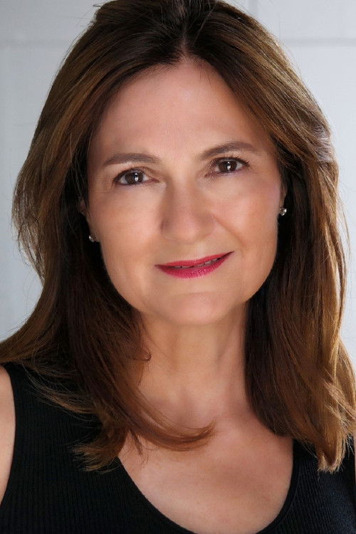 Liz Chuday as News Anchor