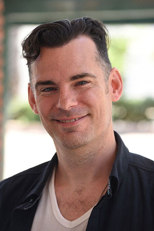 Nathan Scoggins as Hugo