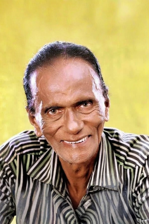 Gemunu Wijesuriya as Baby C. Walgampaya 'Babi Achchi'