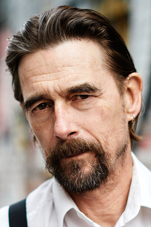 Christian Holzmann as Andrej