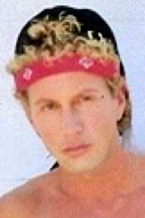 Tad Garrett as (segment "Blue Collar, White Heat")