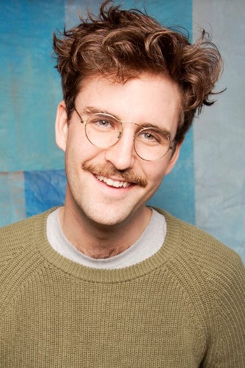 John Reynolds as Greg Trail