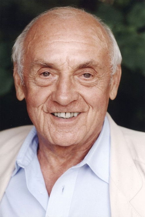 André Lutrand as Father Colin