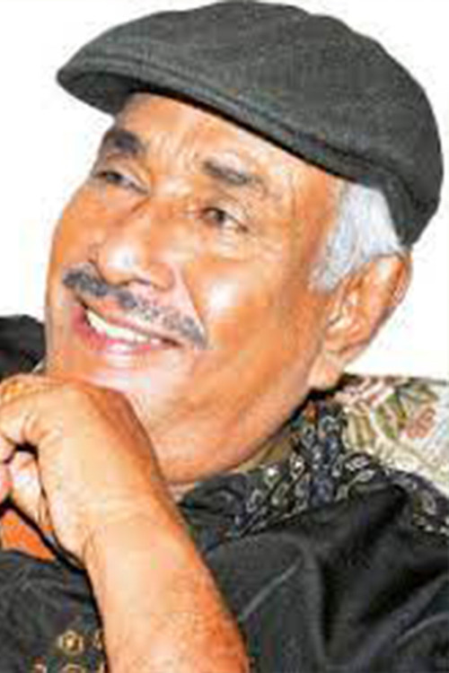 Rex Kodippili as Tintin's Father 'Danapala'