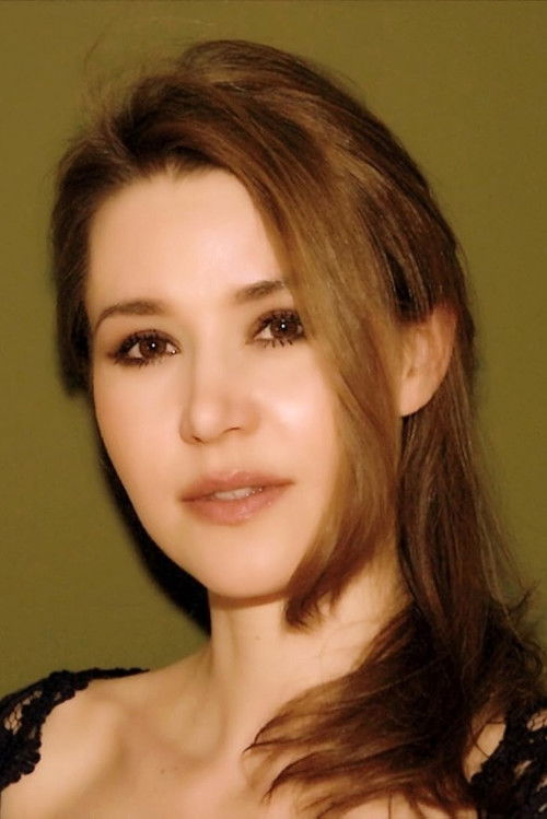 Ilona Six as Woman Behind Wheelchair