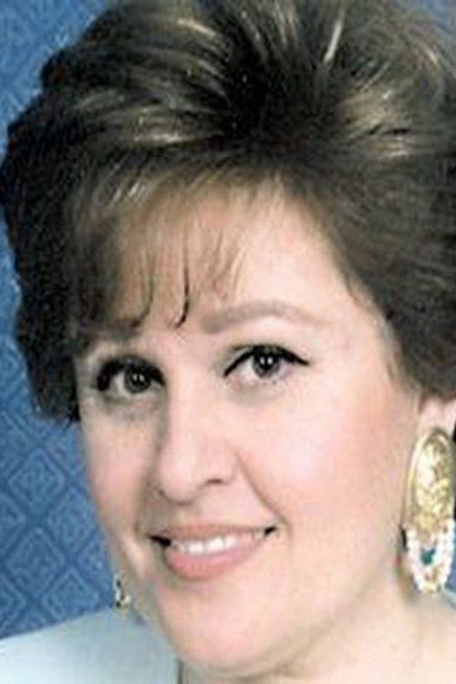 Suzan Hasan as المذيعة