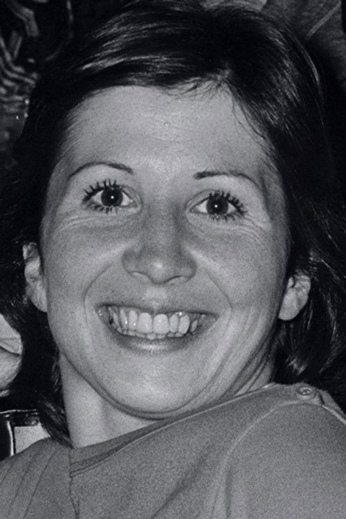 Ann Travolta as Bank Teller