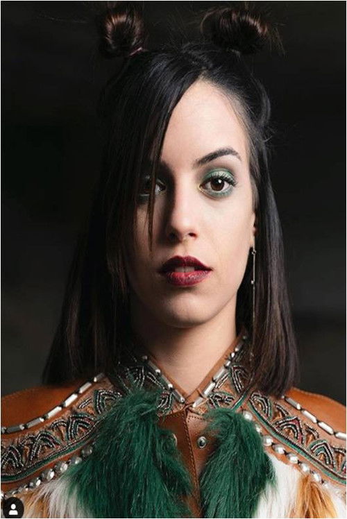 Marina Agrelo as Reportera TV