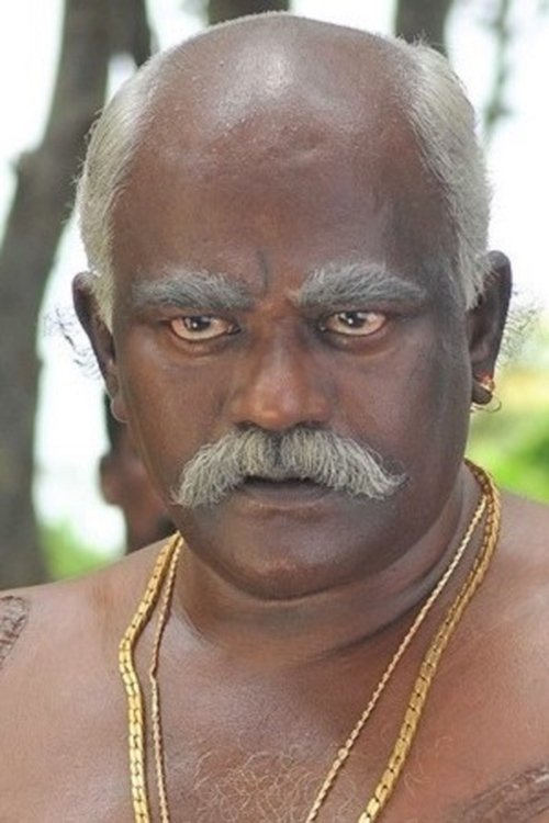 'Poo' Ram as Karnan's father