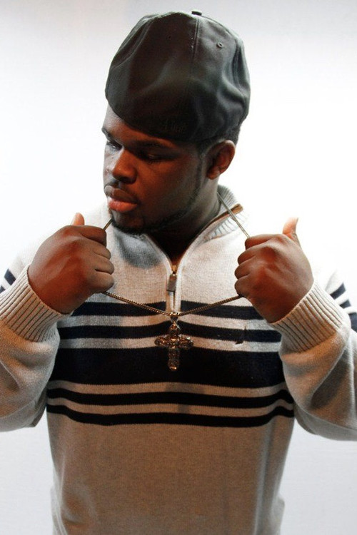 Louie Pizzle as News Anchor Jamal Icerd