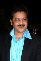 Udit Narayan as Amar