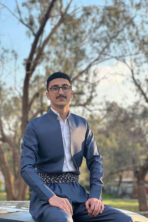 Karzan fazll as white figure