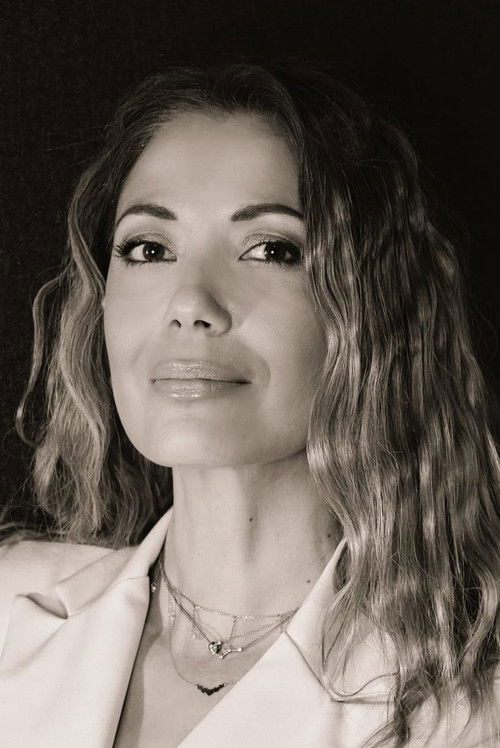 Giota Tsimprikidou as Host (2005)