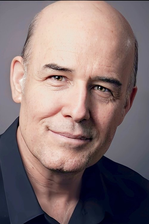 Greg Paul as The Facilitator