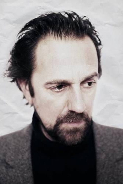 Diego Vasallo as Voz, guitarra eléctrica y acústica (self)