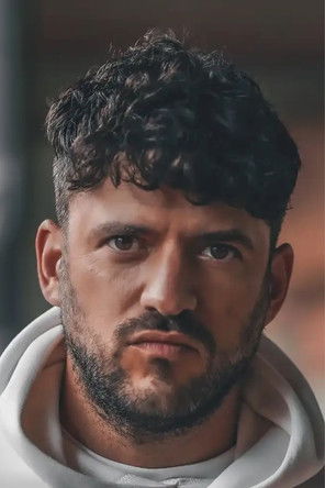 Luke Tumber as Militia