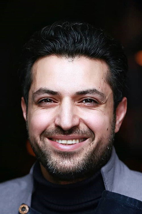 Ashkan Khatibi as 