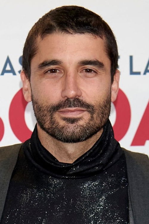 Álex García as Amadeo Lax