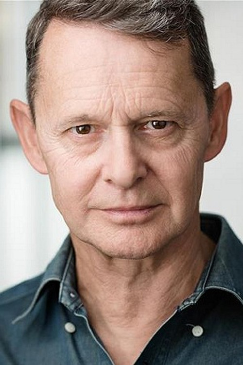 Jonathan Oliver as Policeman