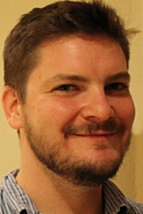 Luis Sanchez-Cañete as News Reader #2