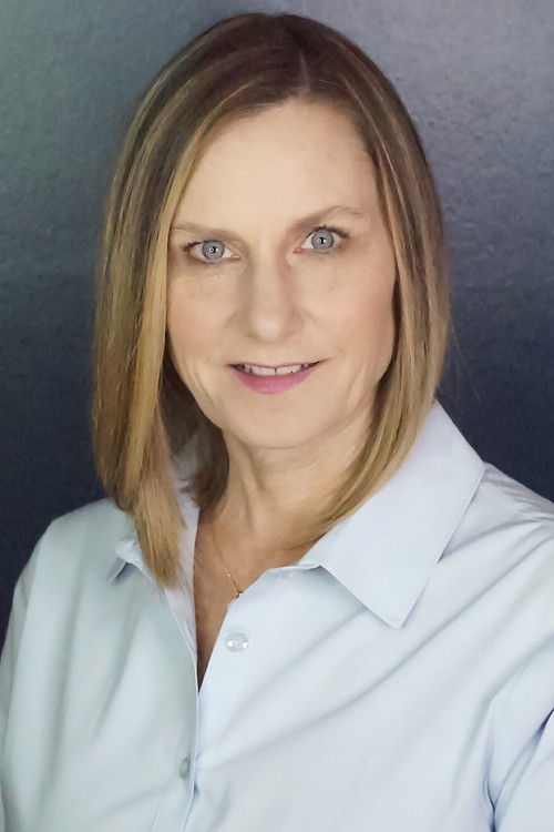 Laura Kehoe as Town Resident