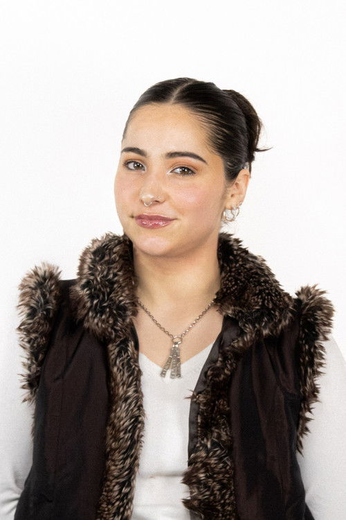 Emily Lunson as Alicia