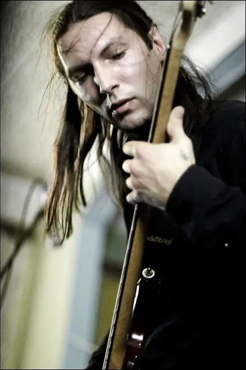Evgeny Trishin as Бас-гитарист