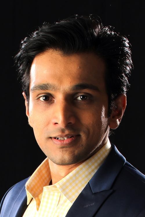 Pratik Gandhi as Sumit Nagindas Gandhi