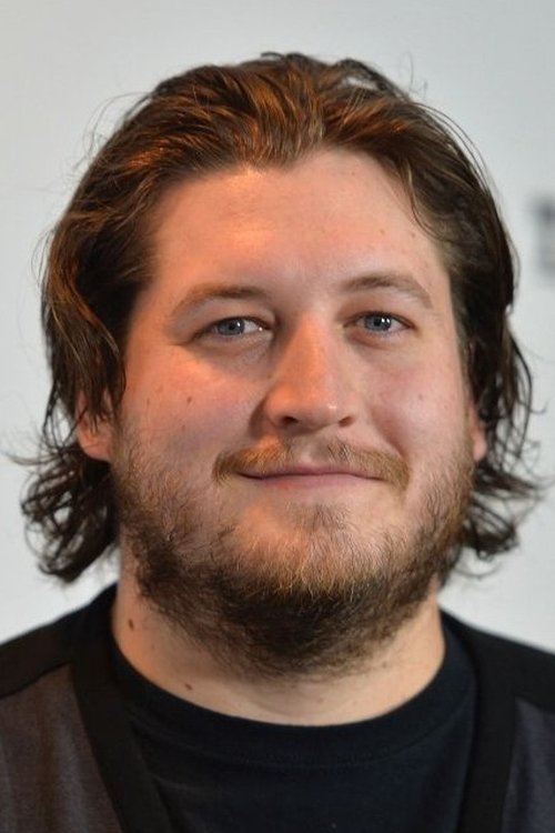 Gareth Evans as Porn Den Videographer