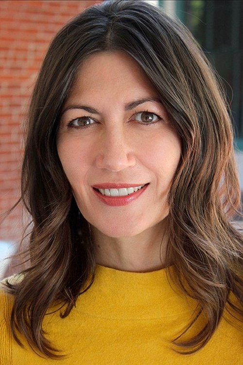 Sheila Sawhny as Carol, FA Member