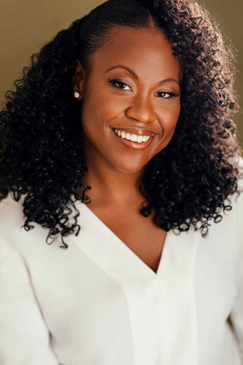 D'Arquoia Connor as News Anchor