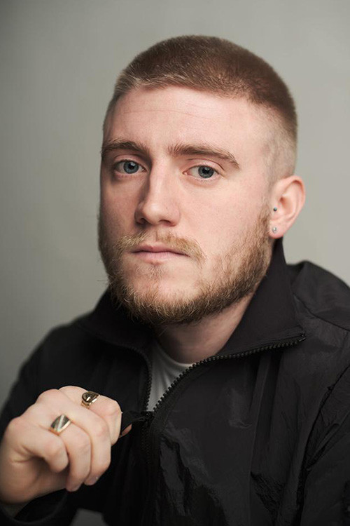 Ross Thompson as Grayson