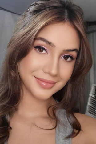 Sarah Holmes as Cory Aquino