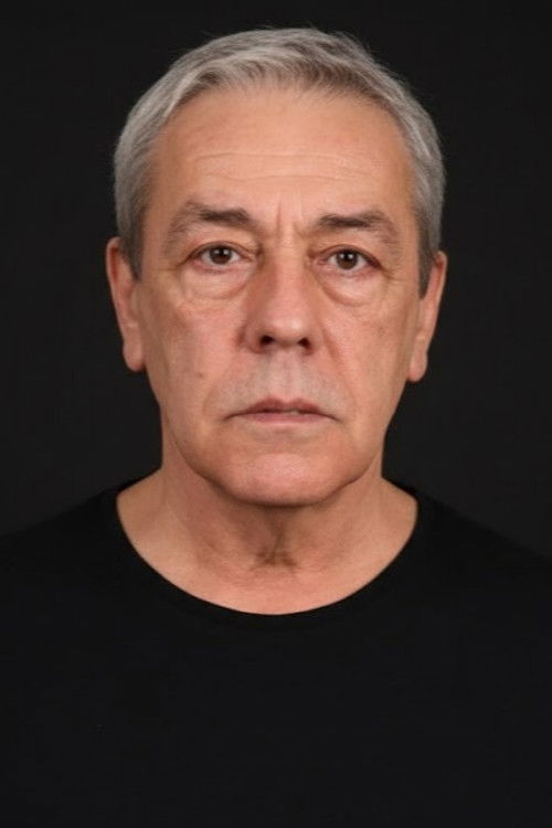 Münir Akça as Hikmet