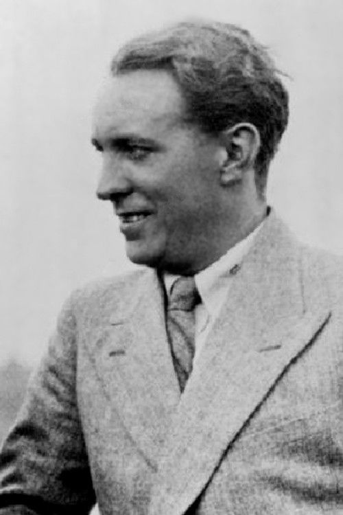 Charles Bennett as Amos Divine