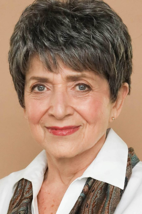 Joette Waters as The Shopkeeper