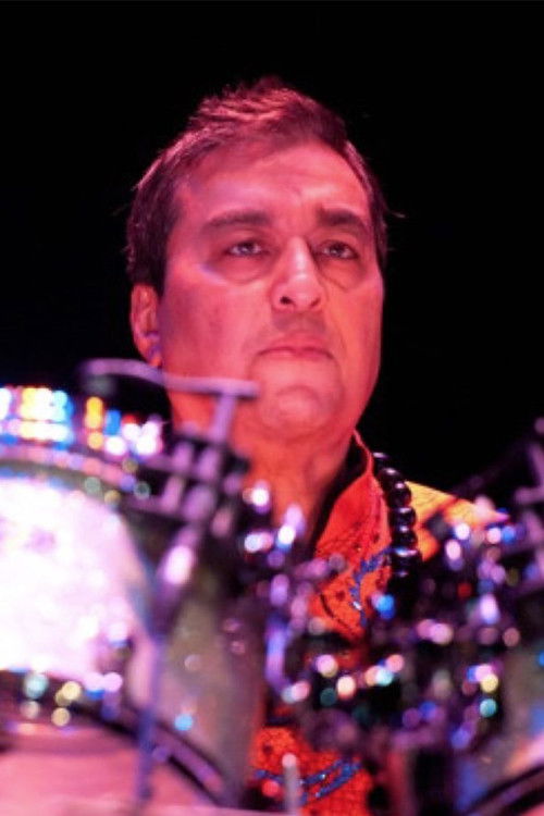 Kevin Ellman as Himself (Drums)