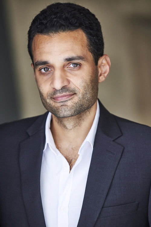 Omar El Gamal as Arabic News Anchor